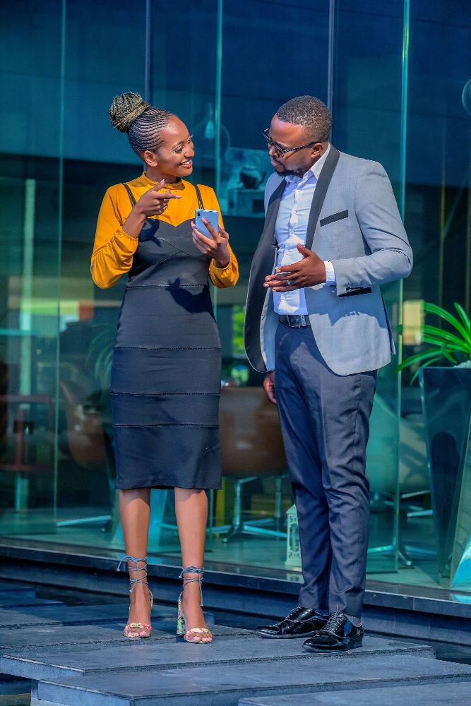 Two colleagues discussing a project